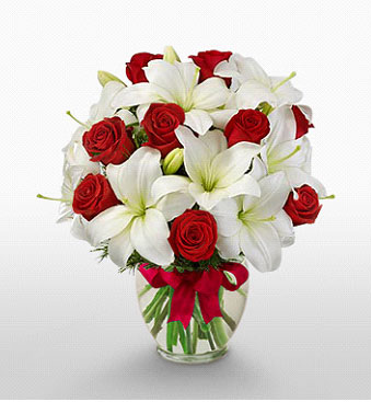  Eskişehir uluslararası çiçek gönderme  1 dal kazablanka 11 adet kırmızı gül vazosu